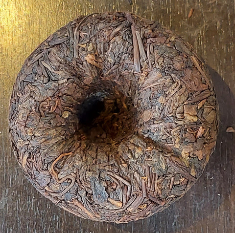 Lao Ban Zhang Shu Pu Erh aus Yunnan 200g Cake (30 Jahre alt)